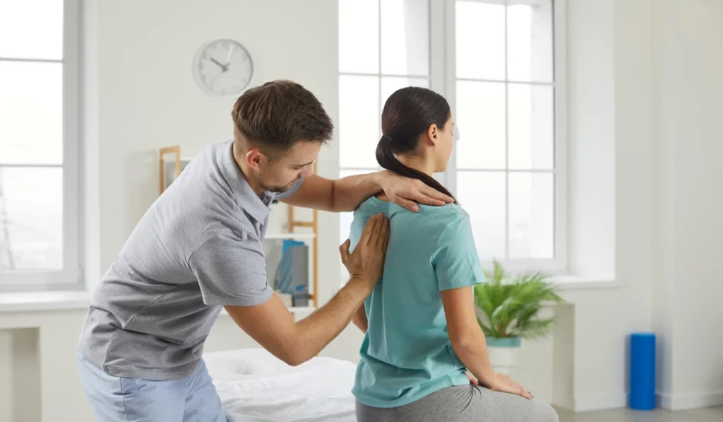Chiropractor and patient